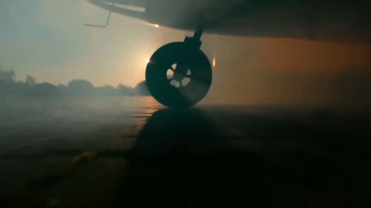 Gyroplane silhouetted against the sunset
